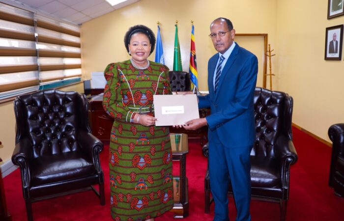 Minister of Foreign Affairs and International Cooperation Senator Pholile Shakantu receives the letter of appointment for Dr. Fekadu Fufa Dinssa as Country Representative for the World Vegetable Center in Eswatini, Thursday.
